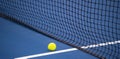 Tennis net and ball and hard court. Professional sport and tennis competition concept Royalty Free Stock Photo