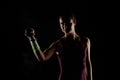 Tennis player girl with magnesium powder on her hands, grabbing a ball with dust visible Royalty Free Stock Photo