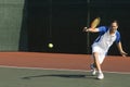 Tennis Player Hitting Backhand On Court Royalty Free Stock Photo