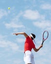 Tennis player hitting the ball, jumping. Professional tennis player in a jump hits the ball. sport background, vertical Royalty Free Stock Photo