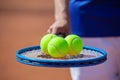 Tennis Player with Racket and Balls Royalty Free Stock Photo