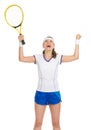 Tennis player with racket rejoicing in success Royalty Free Stock Photo