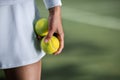 Tennis player in sportswear with a ball Royalty Free Stock Photo