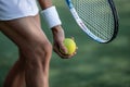 Tennis player in sportswear with a ball Royalty Free Stock Photo