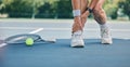 Tennis player or woman with ankle pain on sports ground for healthcare risk, muscle accident or training problem Royalty Free Stock Photo