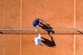 Tennis Players Greeting Each Other Over the Net Royalty Free Stock Photo