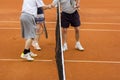 Tennis players shake hands Royalty Free Stock Photo