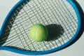 Tennis racket and ball on the floor Royalty Free Stock Photo
