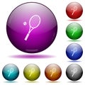 Tennis racket with ball icon in glass sphere buttons