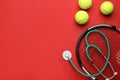 Tennis racket, balls and stethoscope on red background, flat lay with space for text. Doping concept Royalty Free Stock Photo