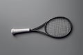 Tennis racket on gray background. Generated AI Royalty Free Stock Photo