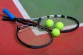 Tennis rackets, balls and court Royalty Free Stock Photo