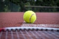 Tennis scene with ball, racquet and line Royalty Free Stock Photo