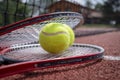 Tennis scene with black net, balls and racquet Royalty Free Stock Photo