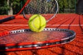 Tennis scene with net shadow, ball and racquet Royalty Free Stock Photo