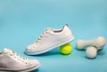 Tennis shoes on blue background Royalty Free Stock Photo