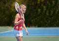 Tennis, sport or woman with racket on court for competition, match or training outdoor in nature. Player, person or game Royalty Free Stock Photo