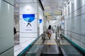 Moving walkway toward 2020 Tokyo Olympics Tennis poster.