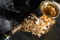 Tenor sax golden saxophone macro with selective focus on black