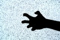 Tense weirdly twisted fingers, hand black silhouette isolated on TV screen, noise, closeup. Fear, anger, insanity, rage, mental Royalty Free Stock Photo