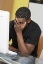 Tensed Man Looking At Desktop PC Royalty Free Stock Photo