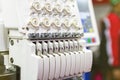 Tensioner assy thread adjust of modern & automatic high technology multi needle sewing or embroidery machine for textile-clothing- Royalty Free Stock Photo