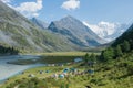 Tent camp near the lake Akkem Royalty Free Stock Photo