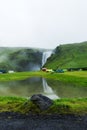 Tent camp near Skogarfoss waterfall in Iceland Royalty Free Stock Photo