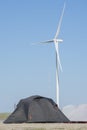 Tent camp near the wind turbines. Outdoor tourism