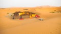 Tent camp for tourists in sand dunes of Sahara, Morocco Royalty Free Stock Photo