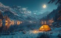 Tent is heated by campfire at night in the mountains by the lake Royalty Free Stock Photo