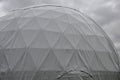 Tent with hemispherical structure with triangle support frame. The white plastic is made of white plastic tarpaulin. The casing ha Royalty Free Stock Photo