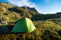 Tent in the mountains in the Alps, Europe still life coach, company, friendship, background - concept