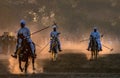 Tent pegging is famous traditional game of rural areas of punjab Pakistan, riders on the horses with lance in dust