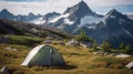 A tent pitched in the mountains under a sunset sky, rugged terrain and the fading light of day. Royalty Free Stock Photo