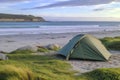 Tent Pitched On Sandy Beach, Offering Coastal Camping Bliss. Generative AI