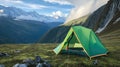 A tent pitched up in the middle of a mountain