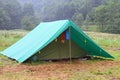 Tent in a scout camp on the lawn in the mountains in summer Royalty Free Stock Photo