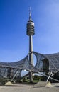 The tent shaped roof of the olympic stadium and Television Tower in Olympic park at Munich, Germany