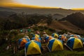 Tent in the sunset overlooking mountains Royalty Free Stock Photo