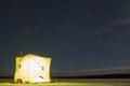 Winter fishing tent at night. Royalty Free Stock Photo