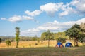 Tents at camping site in forest Royalty Free Stock Photo
