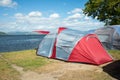 Tents on a camping site near a lake Royalty Free Stock Photo