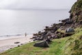 Tents on a grass by Keem beach, fog over the ocean