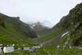 Tents on hills in Hampta Pass, India Royalty Free Stock Photo