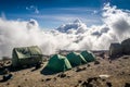 Tents over clouds for people trekking Mount Kilimanjaro Royalty Free Stock Photo