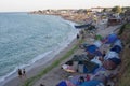 Tents pitched along the beach in Vama Veche