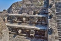 Detail of the pyramid in Teotihuacan, showing the heads of Tlaloc left and the feathered serpent right in alternating arrangem Royalty Free Stock Photo