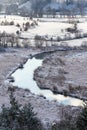 Tepla River in snowy winter landscape near Cihelny, Karlovy Vary Royalty Free Stock Photo