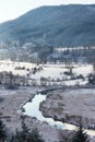 Tepla River in snowy winter landscape near Cihelny, Karlovy Vary Royalty Free Stock Photo